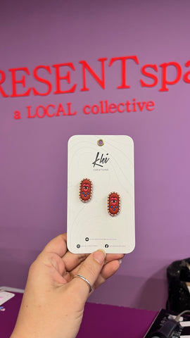 Earrings sad eye stud rust