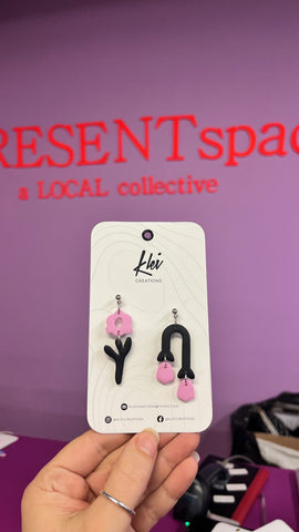 Earrings asymmetrical black light pink flowers